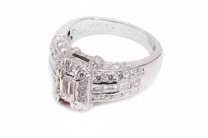 18K White Gold Classic Diamond Ring with Emerald Cut Baguettes and Round Diamonds. TDW: 2.50ct VS FG