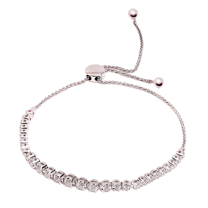 10K White Gold Adjustable Bolo Diamond Bracelet. TDW: 0.45ct SI GH