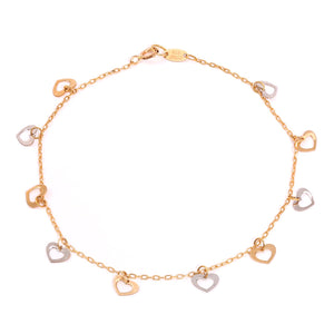 Yellow gold station bracelet with white and yellow gold heart, 18k, 6 1/2 Inches, 1.62gr