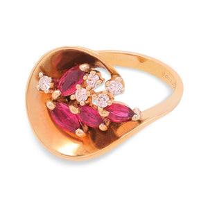 Yellow Gold Marquise Shape Ruby and Diamond Ring. 4 Marquise Shape Ruby and 5 Round Diamonds. TRW: .8ct. TDW: 0.075ct