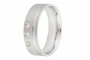 White Gold  Matt Style Band setting with Three Natural Diamonds. 18k TDW: 0.06ct
