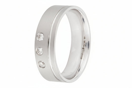 White Gold  Matt Style Band setting with Three Natural Diamonds. 18k TDW: 0.06ct