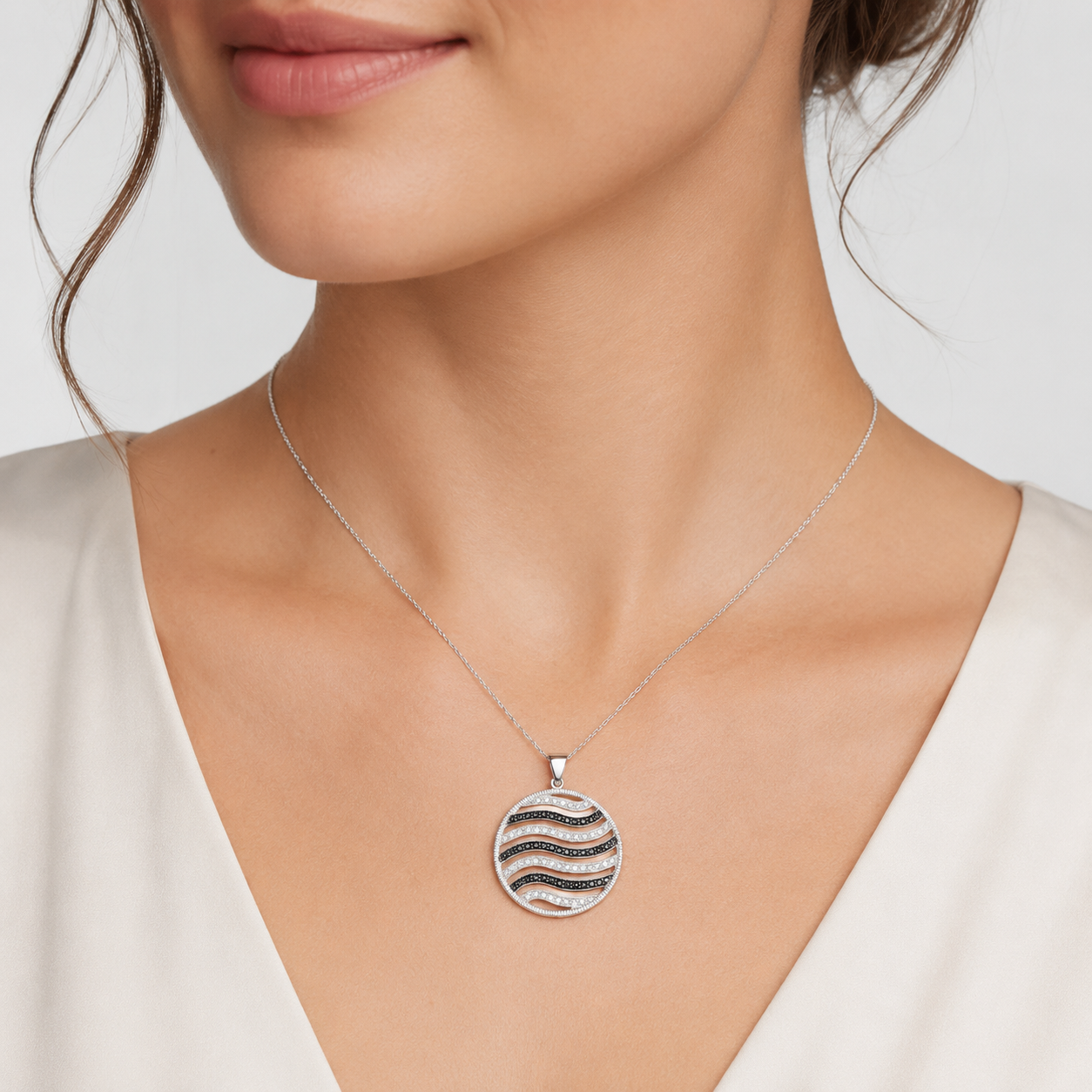 10K White Gold Black and White CZ Wave Pendant