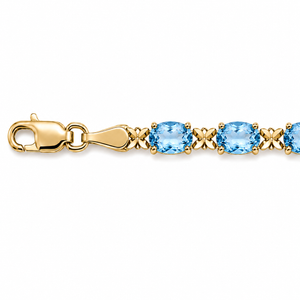 14K Yellow Gold Oval Blue Topaz Tennis Bracelet