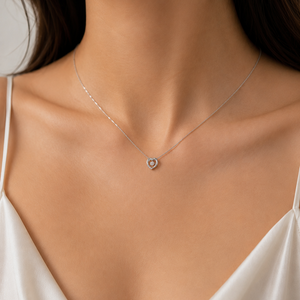 14k White Gold Heart Necklace with Canadian Dancing Diamond TDW: 0.11ct
