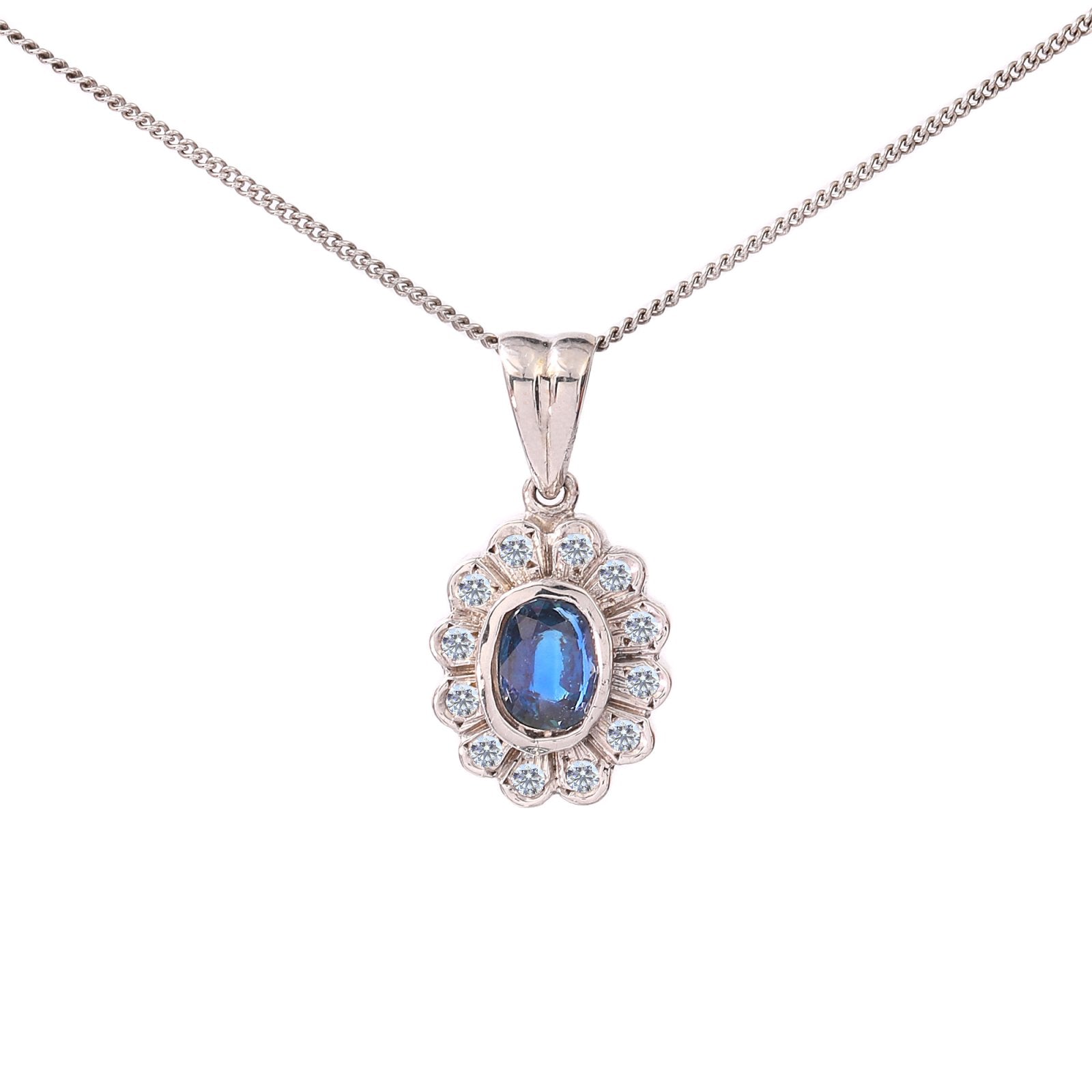 White Gold Sapphire and Diamond Pendant. Sapphire: 0.73ct TDW: 0.24ct SI GH 18k 3.9gr