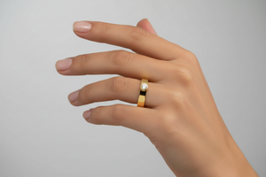 10K Yellow Gold Ring with one round diamond on bezel set TDW:0.10ct H – I I1 – 2