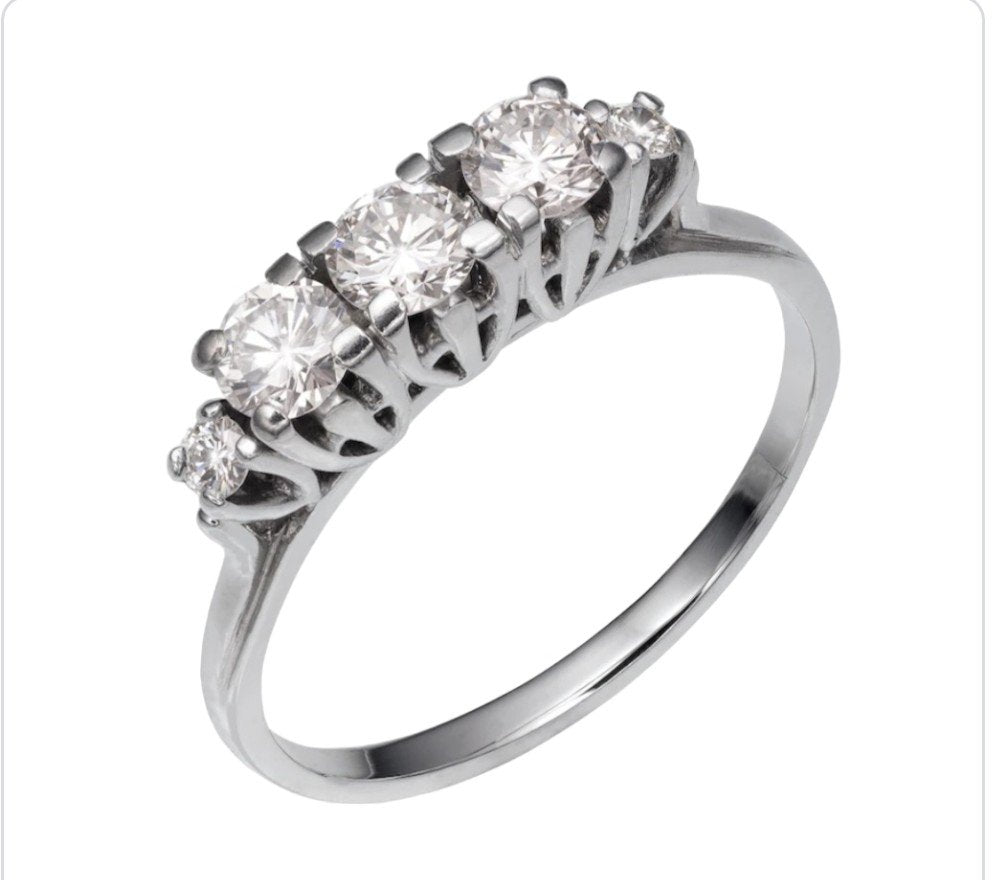 White Gold Diamond Ring with 5 Round Diamonds. 3 diamonds with a higher setting 4mm, 0.25ct/each. And 2 small diamonds on sides 1.5mm, 0.015ct/each. 18k, 4.3gr, TDW: 0.78ct. VS, FG
