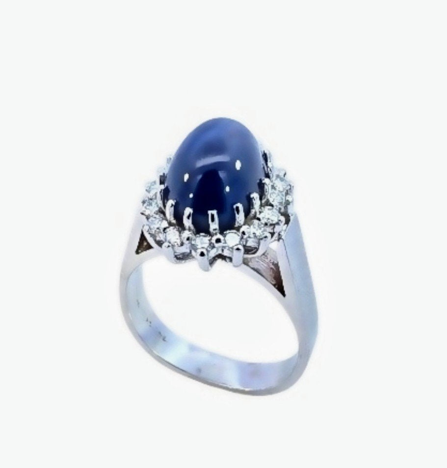 White Gold Enhanced Moon Sapphire and Diamond Ring. 14k, 8.4gr, S: 5.3ct,TDW: 0.48ct
