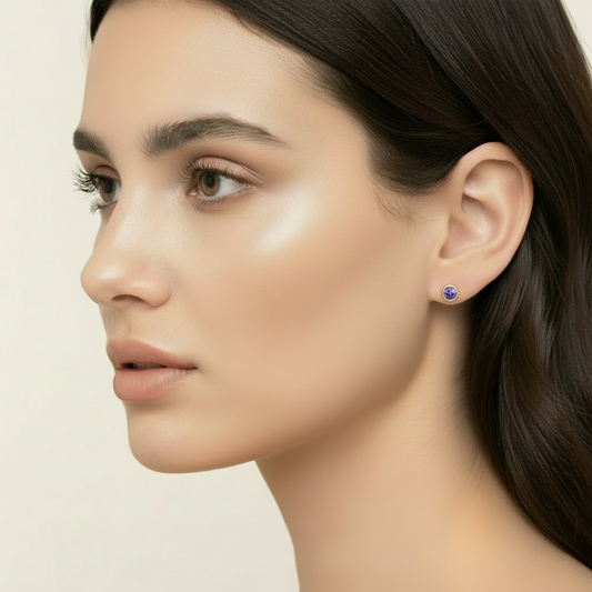 Yellow Gold Tanzanite Bezel Set Solitaire Stud Earrings. 18k