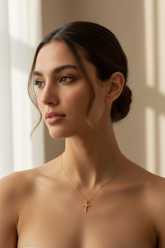 14 K Yellow Gold Plain Hollow Tube Cross Pendant.