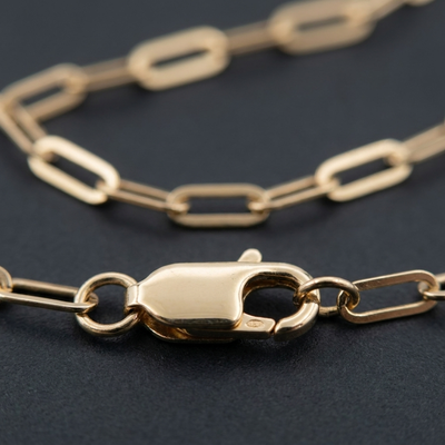 18K Yellow Gold Paperclip Chain Necklace — clasp and link macro detail
