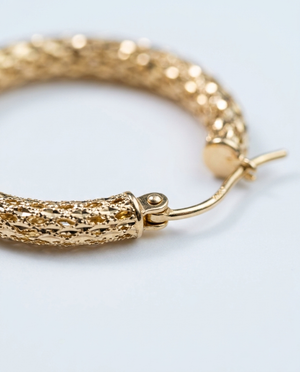 14K yellow gold diamond-cut hoop earrings, 22mm — diamond-cut texture and hinge detail