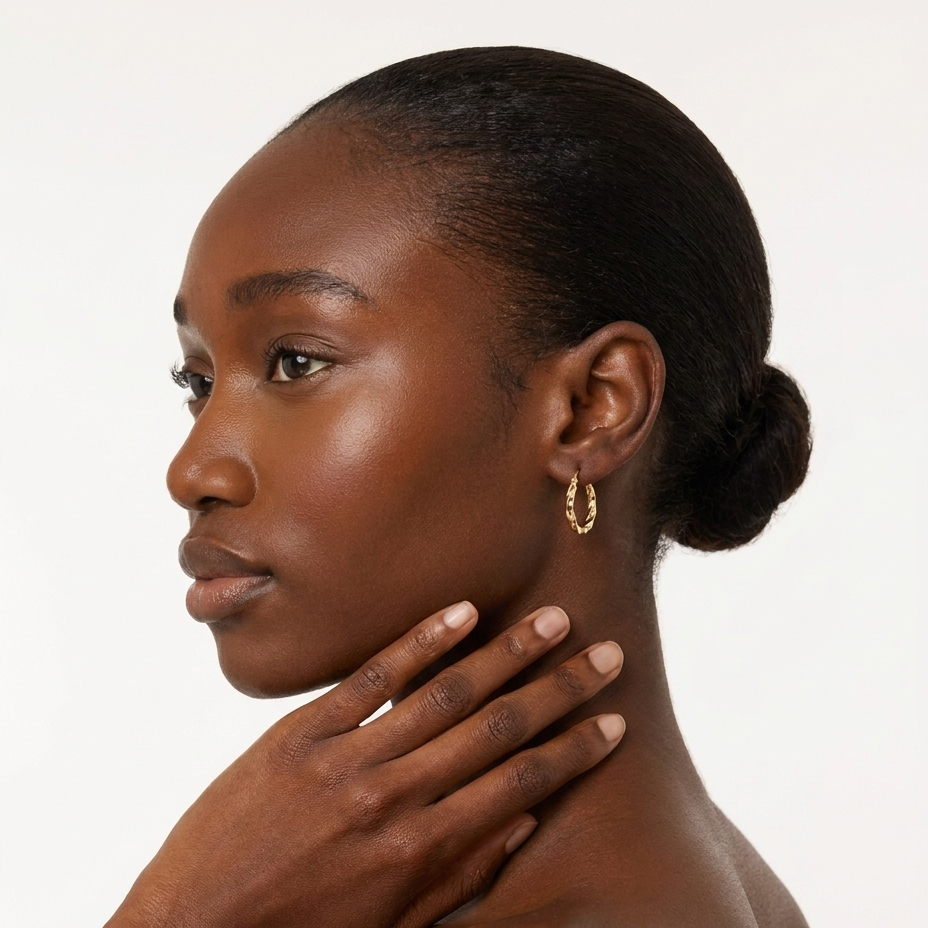 14K Yellow Gold Twisted Hoop Earrings 29mm — on model