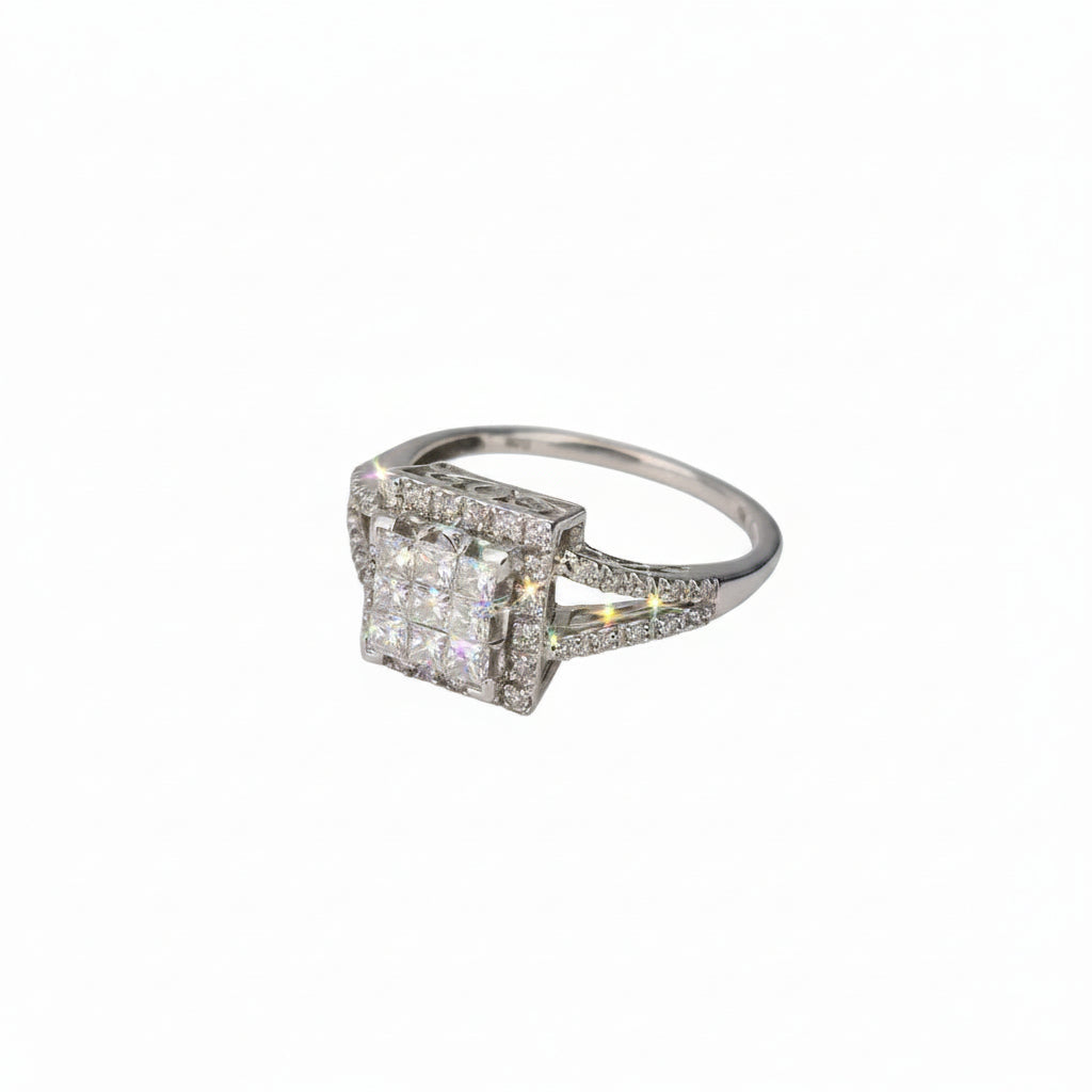 A white gold square halo ring with a double-row diamond center and pavé-set side stones.