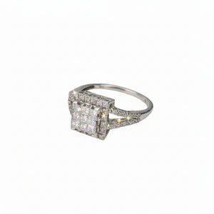 A white gold square halo ring with a double-row diamond center and pavé-set side stones.