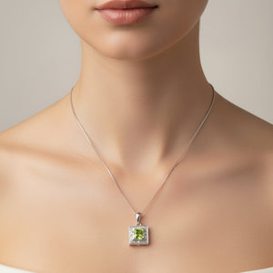 10k White Gold Peridot and Diamond Necklace.