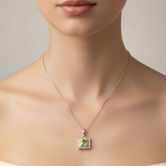 10k White Gold Peridot and Diamond Necklace.