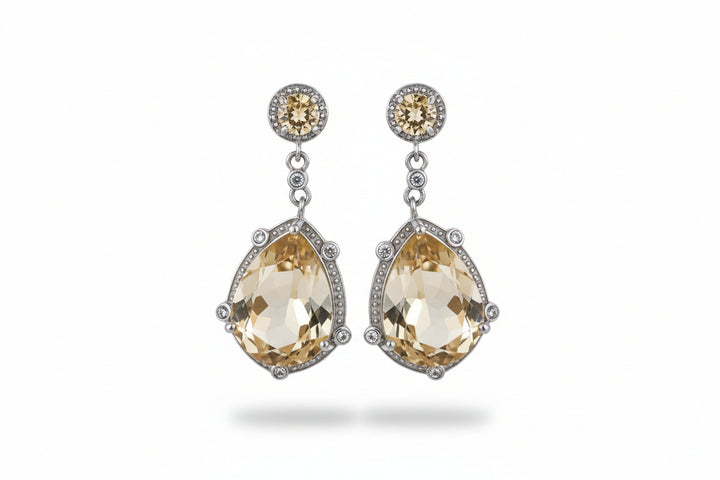Sterling Silver Dangling Earrings with Yellow Crystal
