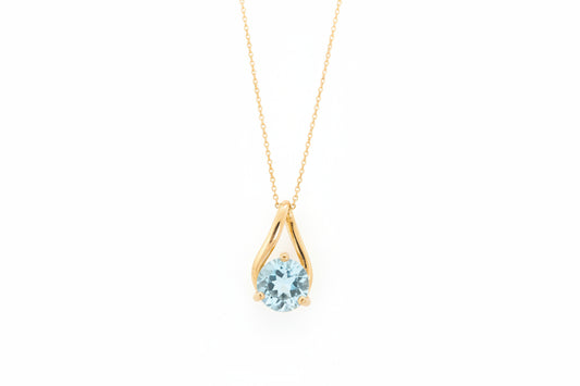 10K Yellow Gold Teardrop Shape Pendant with Blue Topaz.