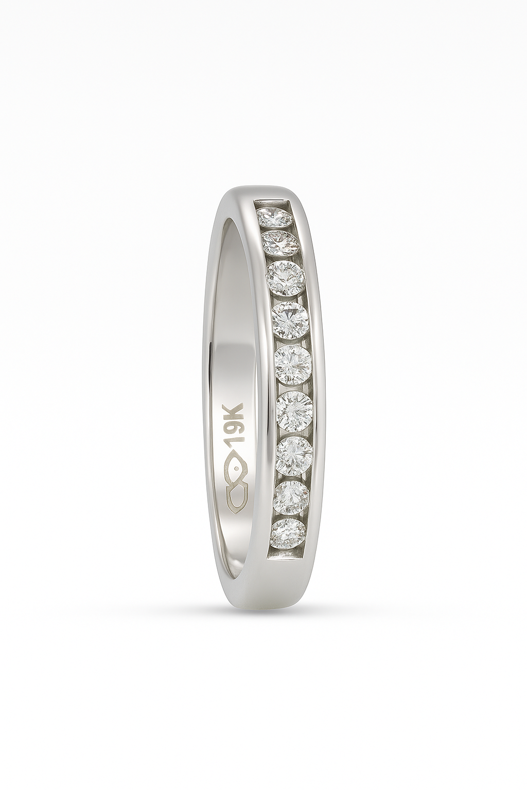 White Gold Channel Setting 10 Stones Diamond Band. 19k,  TDW: 0.20ct. VS, FG