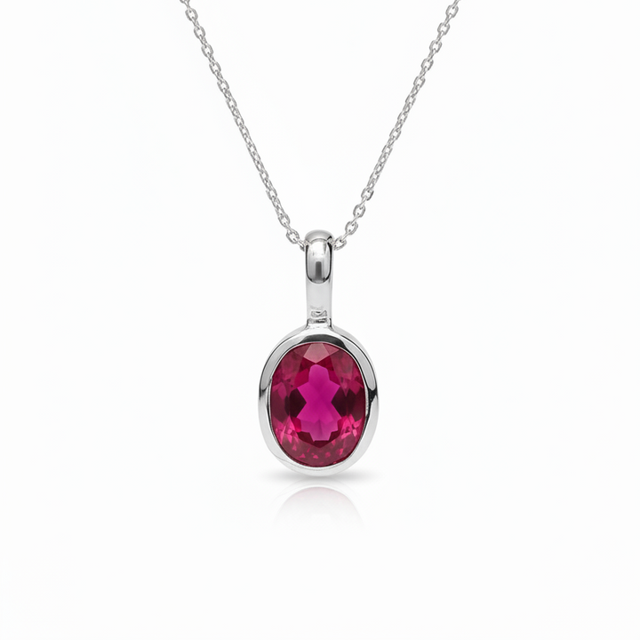 18K White Gold Oval Shape Enhanced Ruby Pendant. 1.40ct